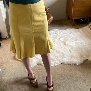 Yellow Fit and flare wool skirt. Searle